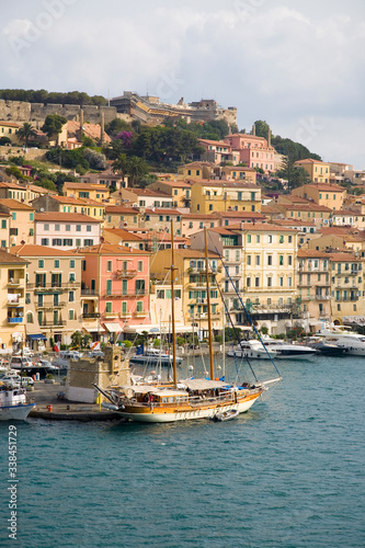 Water view of colorful buildings and harbor of Portoferraio, Province of Livorno, on the island of Elba in the Tuscan Archipelago of Italy, Europe, where Napoleon Bonaparte was exiled in 1814