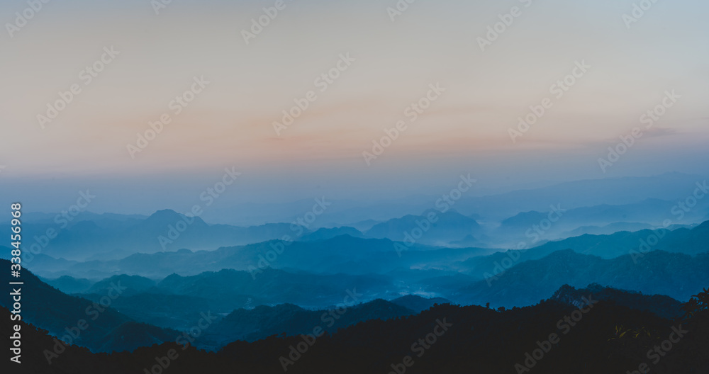 wanderlust and relax in nature from panorama view layer of mountain and haze on spring and summer season