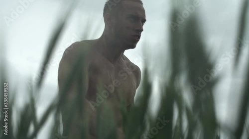 Survivor man in the grass