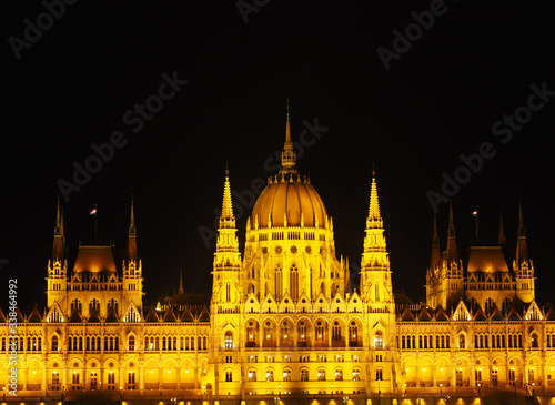 View of the Hungarian Parliament Building at night in Budapest, Hungary.