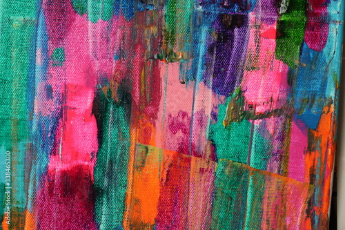 Bright pink, teal, purple, orange, and magenta form vertical strokes in this abstract painting for backgrounds.