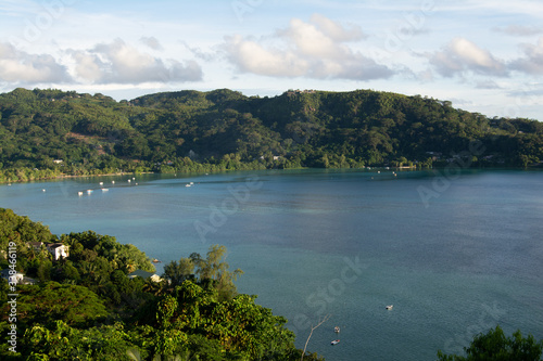 Seychelles tropical landscape photo was taken from the top of the mountain looking out over the Indian Ocean.