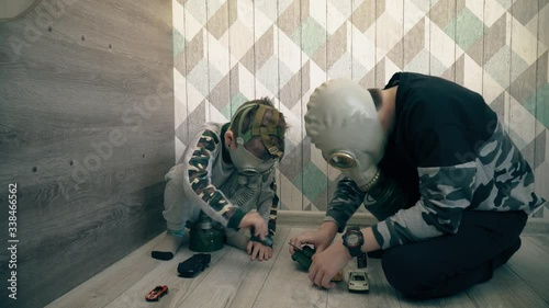 Scared Children In Gas Masks Play With Toys Among Viruses