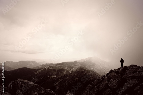 Lonely Man silhouette standing on the view place on mountain in Low Tatras, Slovakia  © Art Johnson
