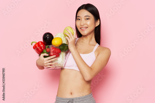 young woman holding an apple © SHOTPRIME STUDIO