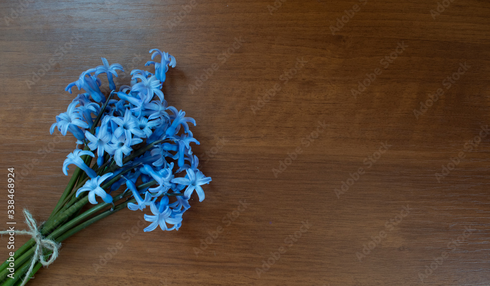 Fototapeta premium Bouquet hyacinth on wooden background