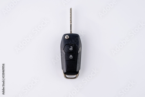 Car keys used to start the engine in a white background