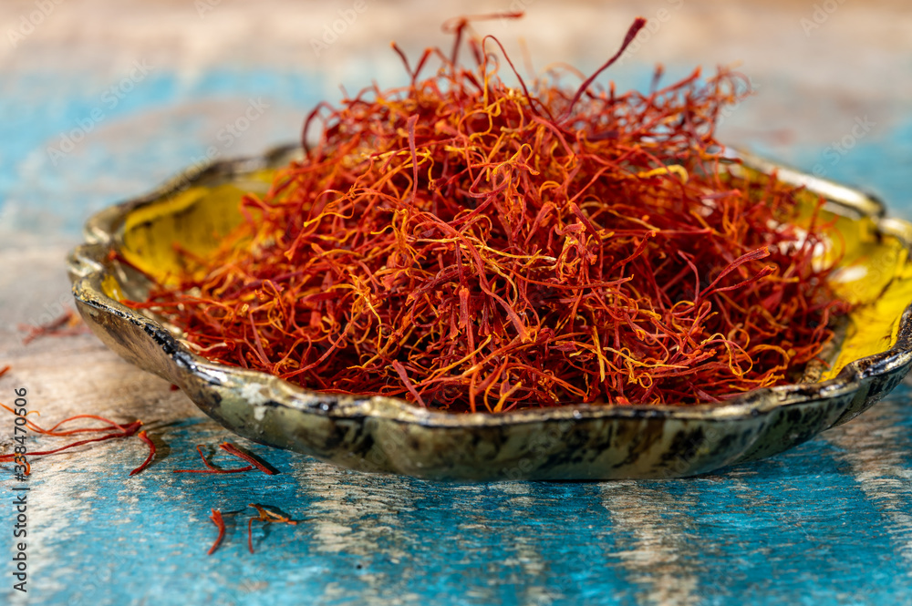 Fototapeta premium Real red dried shaffron spice close up