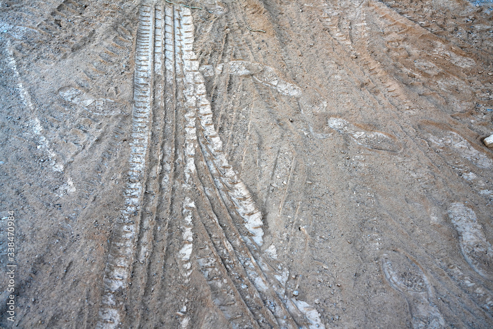 The track of bulldozer on the sand. The track of bulldozer on the sand.