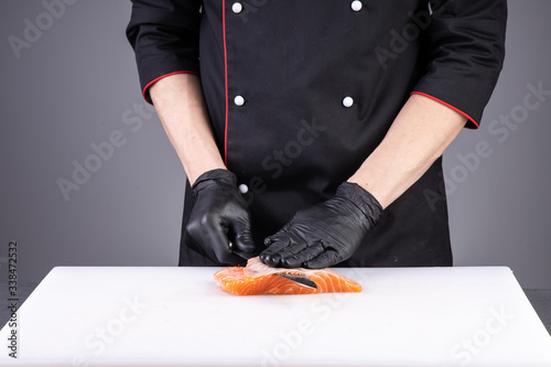  slicing fresh salmon for sushi in a restaurant2