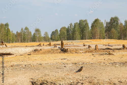 Fototapeta Naklejka Na Ścianę i Meble -  Dull landscape on abandoned mining site with surface dump