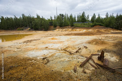 Dull landscape on abandoned mining site with surface dump