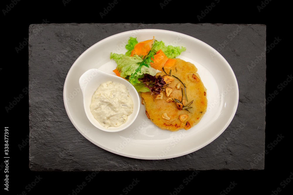 pumpkin pancakes on a white plate pumpkin pancakes on a white plate