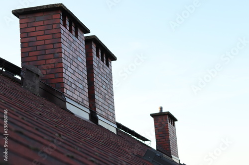 Fototapeta Naklejka Na Ścianę i Meble -  Brown Chimneys on roof