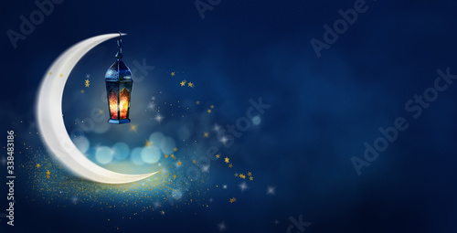 Ramadan Kareem background banner. Islamic Greeting Cards for Muslim Holidays and Ramadan. Blue banner with moon and lantern. photo