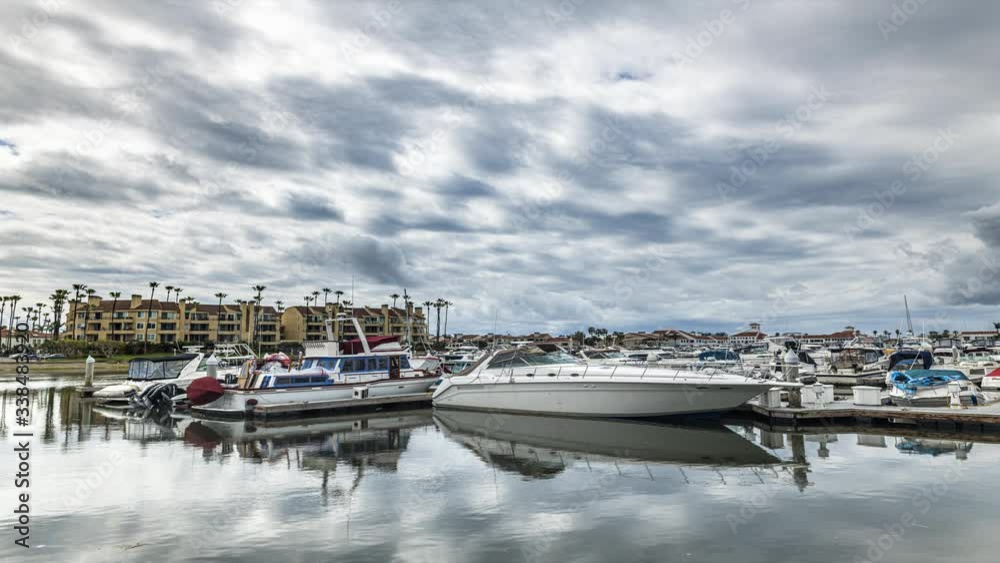 A timelapse of storm clouds moving over Huntington Beach Harbor in southern California. A timelapse of storm clouds moving over Huntington Beach Harbor in southern California.