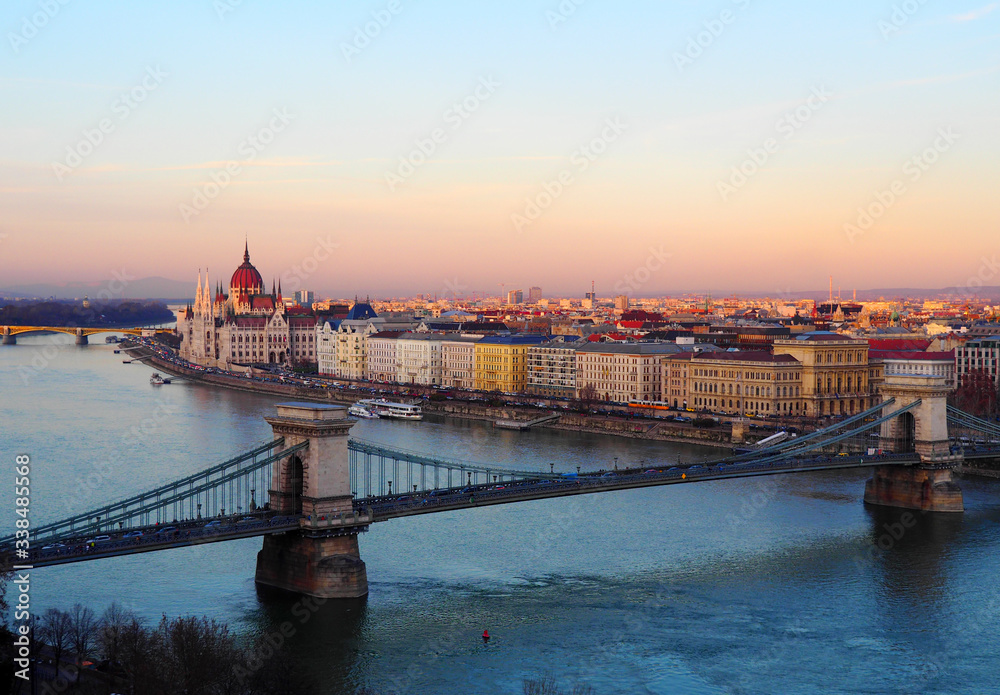 View of the Szechenyi Chain Bridge at sunset in Budapest, Hungary.