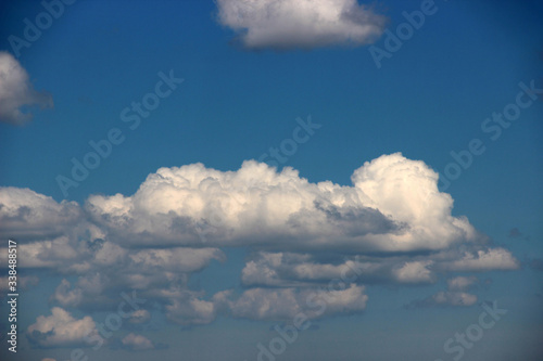 Fototapeta Naklejka Na Ścianę i Meble -  Sky, cloudscape, clouds, heaven, blue, cirrus, white, fluffy, life, happiness, freedom, sensitivity to nature, natural, earth, outdoor, environment, light, bright, tranquility, calm, serenity, peace, 