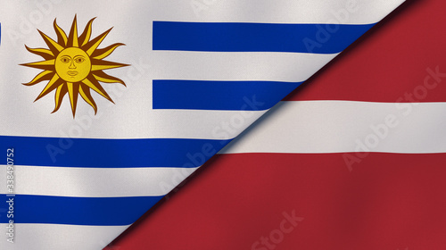 The flags of Uruguay and Latvia. News, reportage, business background. 3d illustration photo
