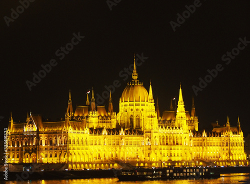 View of the Hungarian Parliament Building at night in Budapest, Hungary.