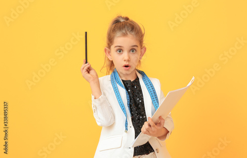 Cute little dressmaker on c...