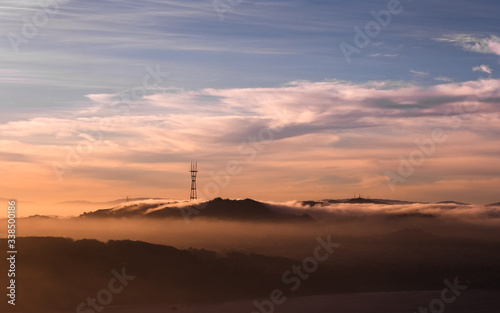 Sutro Tower at golden hour with rolling fog at sunrise, Marin County, CA, USA, November 4, 2018