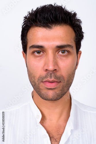Face of handsome Turkish man looking at camera