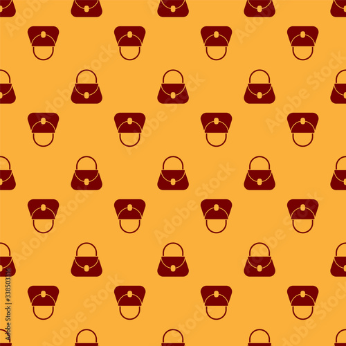 Red Handbag icon isolated seamless pattern on brown background. Female handbag sign. Glamour casual baggage symbol.  Vector Illustration