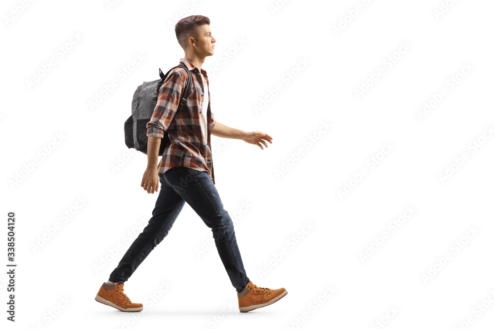 Male student with a backpack walking - obrazy, fototapety, plakaty 