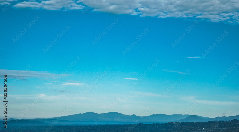 Mountain Landscape With Blue and Misty Sky
