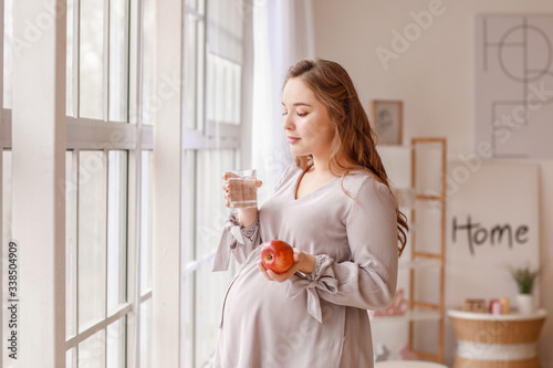 Beautiful pregnant woman wi...