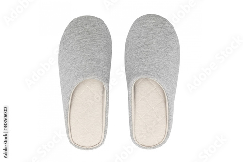 Pair of blank soft black home slippers, design mockup. Hotel bath slippers top view isolated on white background. Clear warm domestic sandal or sneakers. Bed shoes accessory footwear.