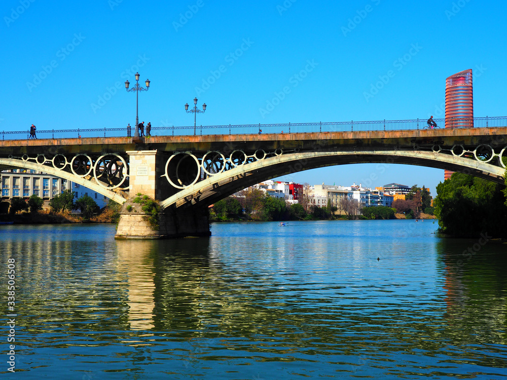 View of the Isabel II Bridge (popularly called Puente de Triana) in Seville, Spain.
