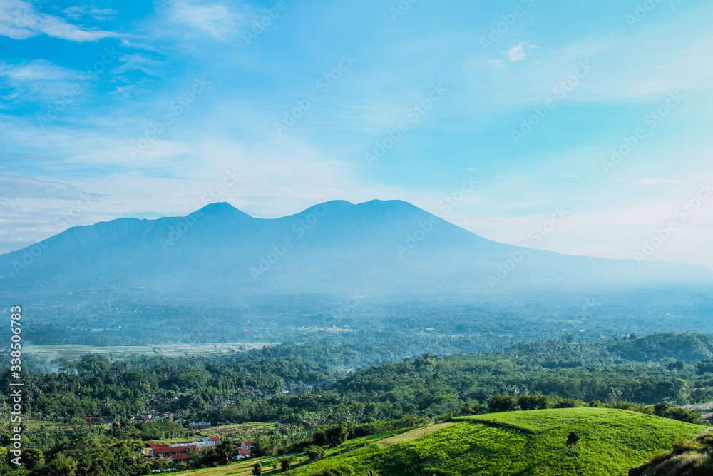 Mountain Landscape With Blue And Misty Sky