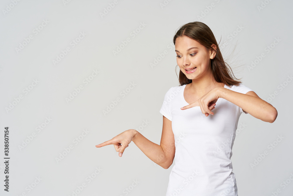 young woman presenting something young woman presenting something