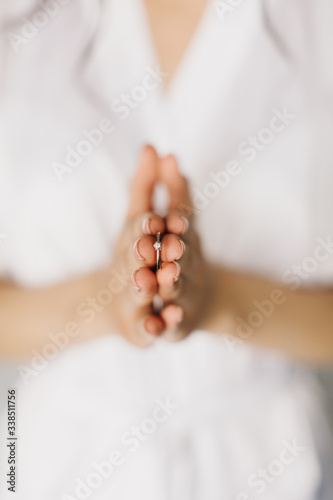 wedding ring on the hand of the bride