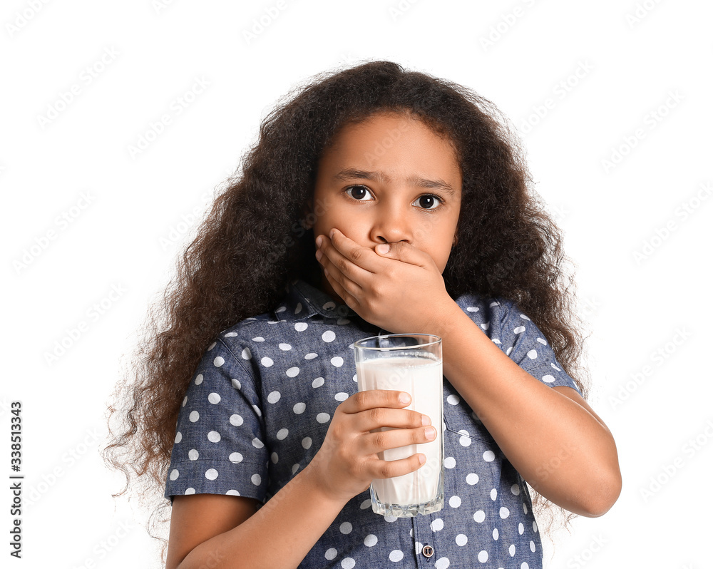 Little African-American girl with dairy allergy on white background Little African-American girl with dairy allergy on white background