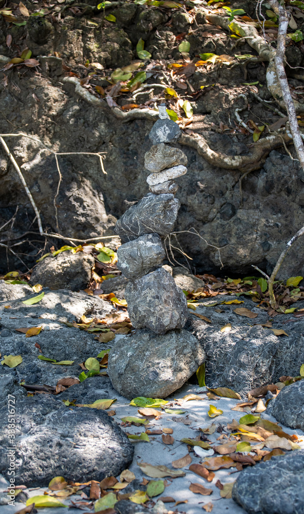 Fototapeta premium Rock cairn on beach