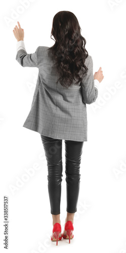 Young businesswoman using v...