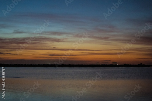 sunrise over lake, launch pad in background, cape canaveral © A. Smith