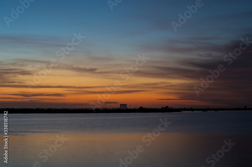 sunrise over lake, launch pad in background, cape canaveral © A. Smith