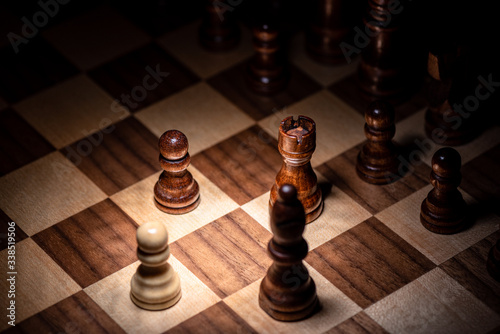 A Closeup View of a Chessboard with Dark Background