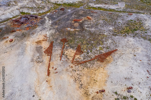 Aerial view of empty fuel drums placed to make art. At an abandoned US Air Force Base.