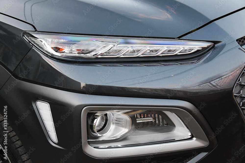 Head light and fog light of a dark grey car, right side