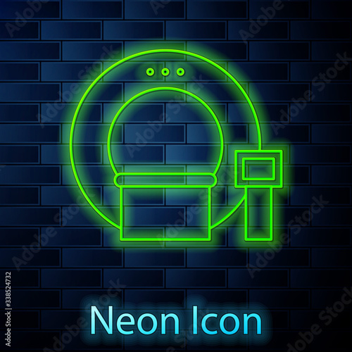 Glowing neon line Tomography icon isolated on brick wall background. Medical scanner, radiation. Diagnosis, radiology, magnetic resonance therapy.  Vector Illustration