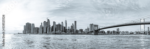 NEW YORK  USA - OCTOBER 1  2018  Wide  black and white  stiched panorama of Manhattan downtown at sunset from the Brooklyn Bridge Park.