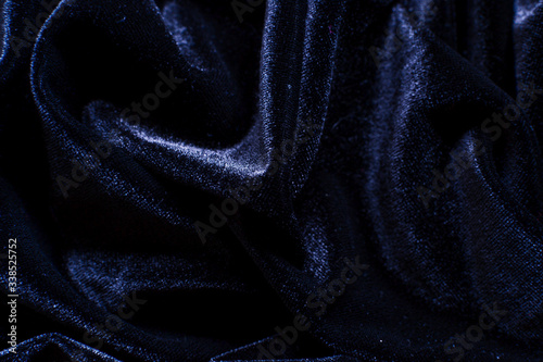 Velvet background. Velvet is blue. dark blue color. Beautiful fabric Abstract