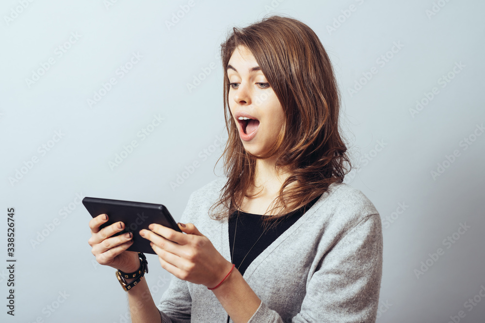 young woman using digital tablet computer young woman using digital tablet computer