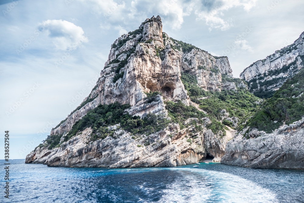 Fototapeta premium Natural caves in gulf of Orosei with turquoise water