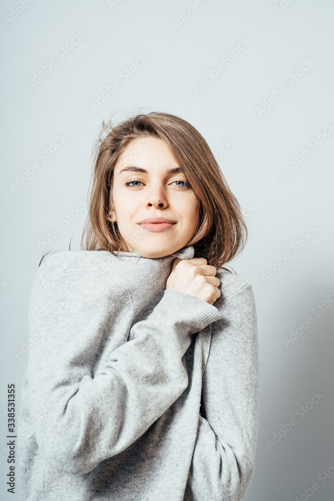 friendly smiling young woman portrait studio shot friendly smiling young woman portrait studio shot